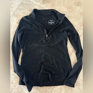 never worn but 2 tiny holes near zipper
has zippered back pocket